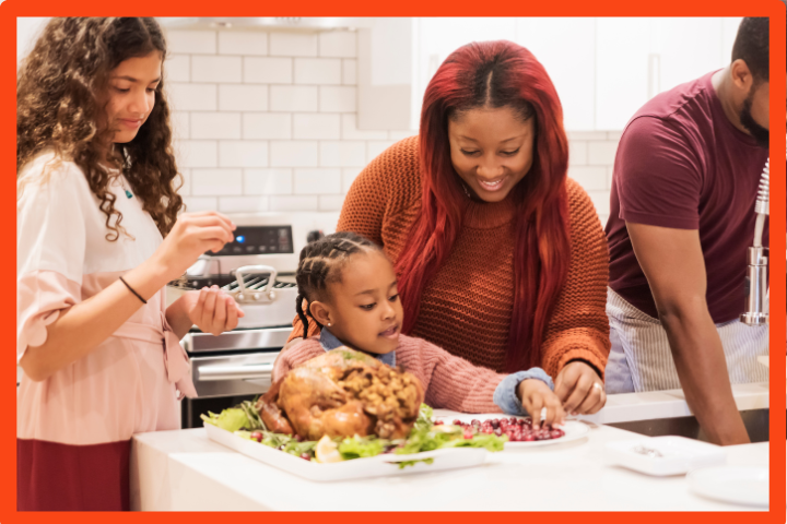 Family preparing Thanksgiving meal